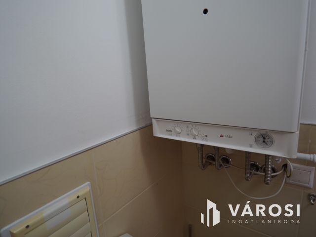 Hévíz csendes, panorámás utcájában, eladó lakás